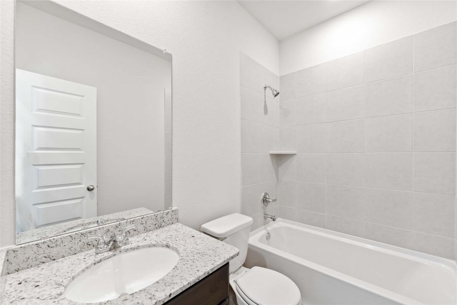 Furnished interior view inside a new home in Southfork Ranch, Sealy (Image 12).