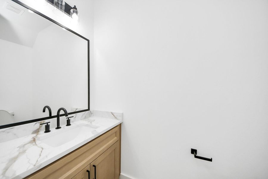 Half bathroom on the first floor. Half bathroom on the first floor.