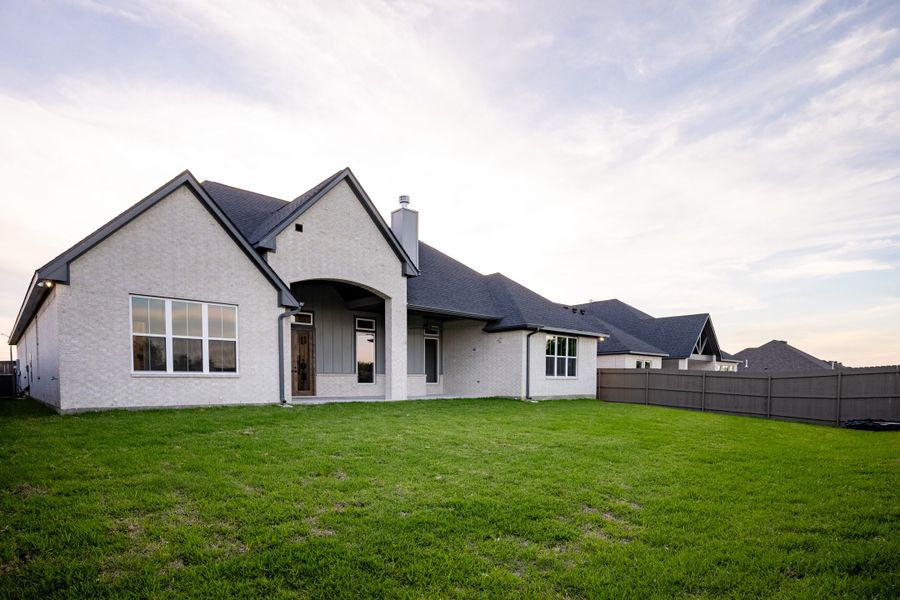 Exterior details and patio area of a home in Stella Ranch, Bryan (Image 32).