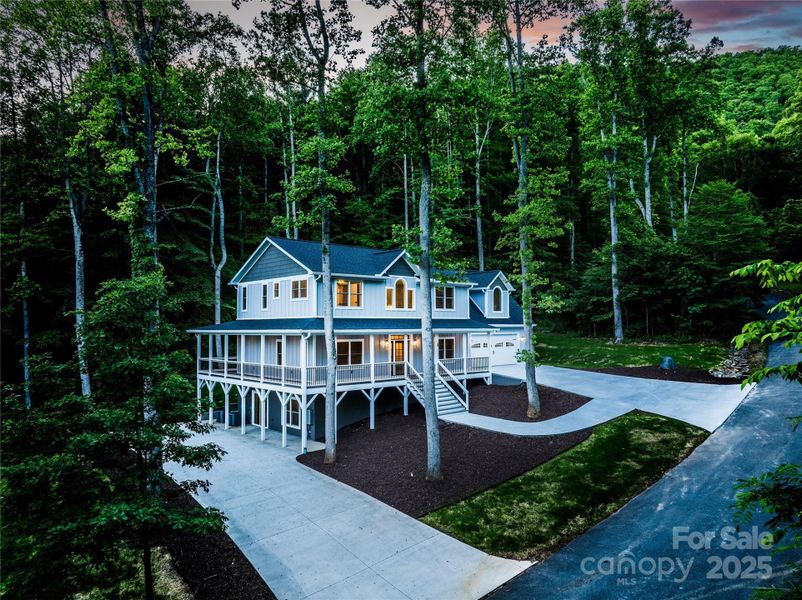 Driveway on the left brings you to the lower level apartment door with no stairs.