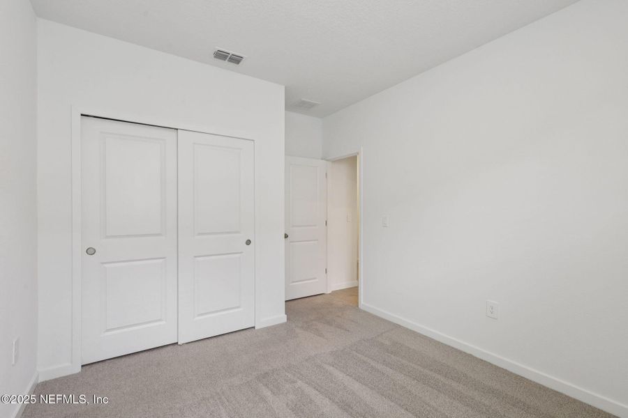 Spacious, unfurnished interior of a new home in Lakes at Bella Lago - Signature Series, Green Cove Springs (Image 23). Spacious, unfurnished interior of a new home in Lakes at Bella Lago - Signature Series, Green Cove Springs (Image 23).