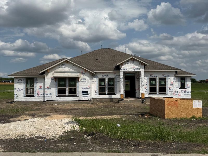 Front exterior of a home in the Scofield Farms Estates community, located in Georgetown, TX (Image 1).