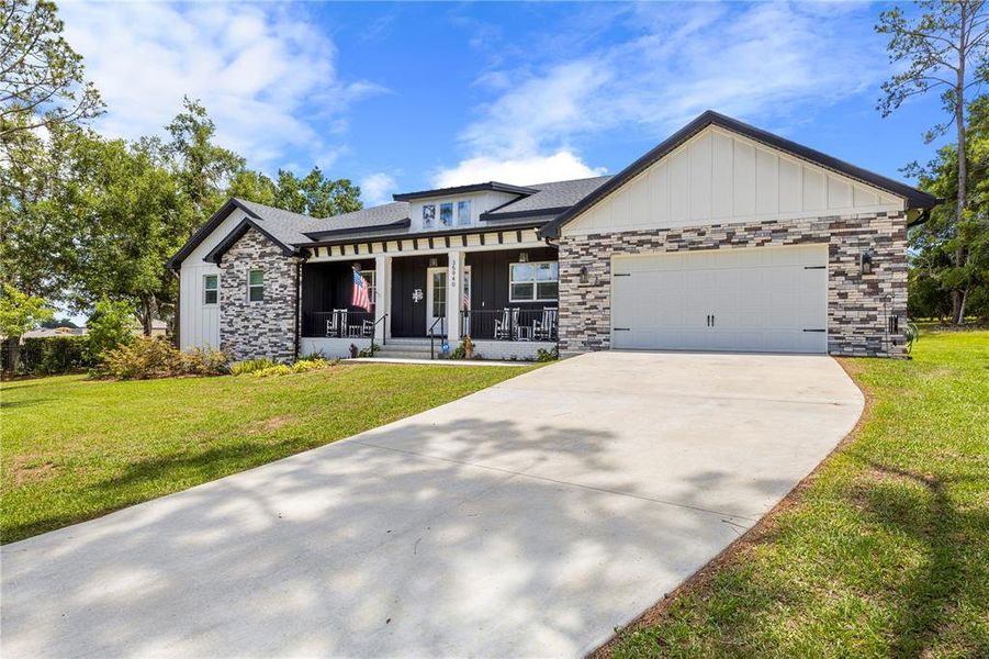Front exterior of a new home in , Dade City, FL, highlighting curb appeal (Image 24).