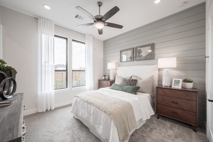 Representative furnished interior of a home built from the Carignan by Tri Pointe Homes in Sienna 80′, Missouri City (Image 39).