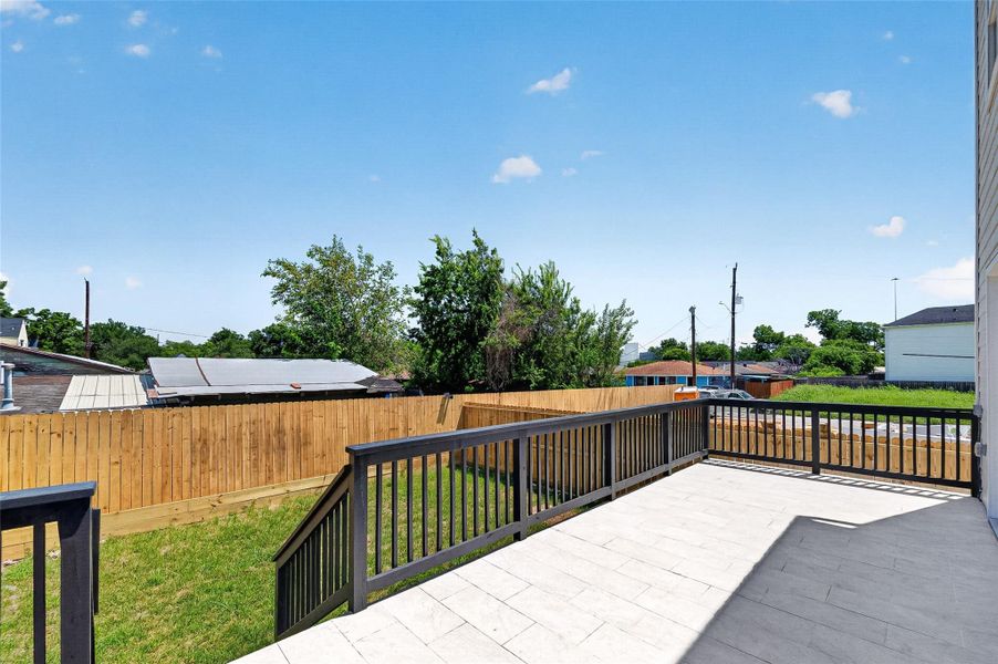 Spacious backyard view as seen from the attached patio. Spacious backyard view as seen from the attached patio.