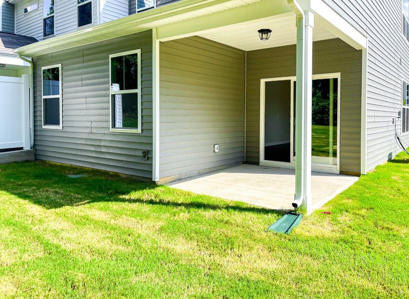 Front exterior of a new home in Fairview Village Townhomes, Simpsonville, SC, highlighting curb appeal (Image 15). Front exterior of a new home in Fairview Village Townhomes, Simpsonville, SC, highlighting curb appeal (Image 15).