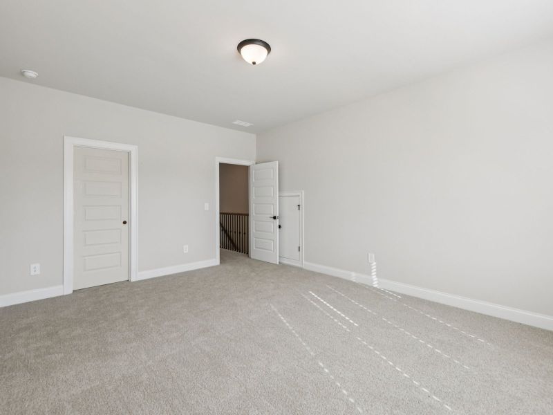 Spacious, unfurnished interior of a new home in Vines at Mill Creek - Legacy Series, Braselton (Image 20). Spacious, unfurnished interior of a new home in Vines at Mill Creek - Legacy Series, Braselton (Image 20).