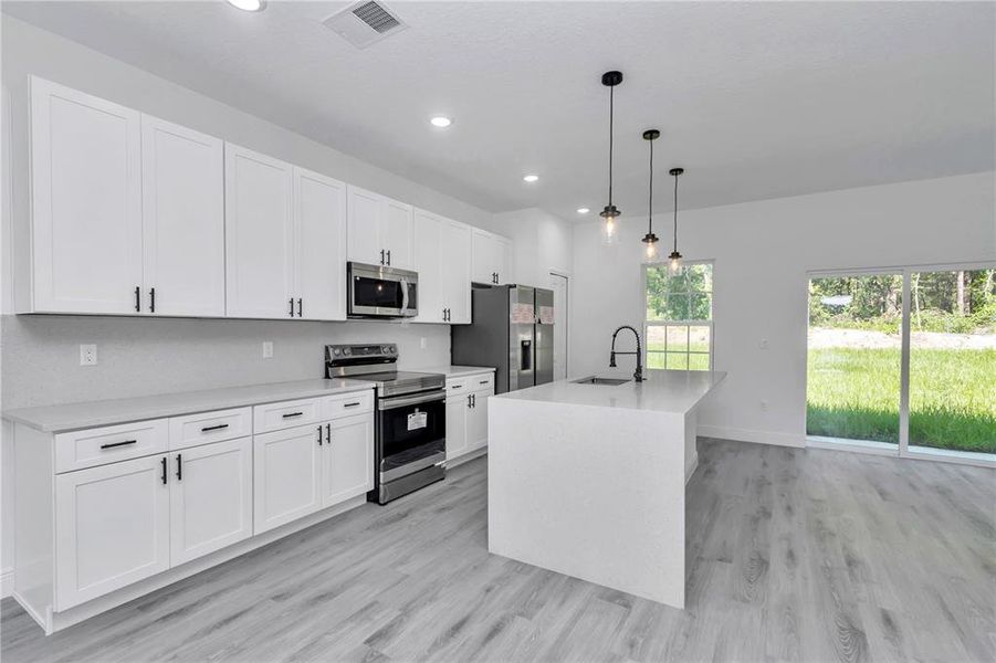 Furnished interior view inside a new home in , Citrus Springs (Image 9).