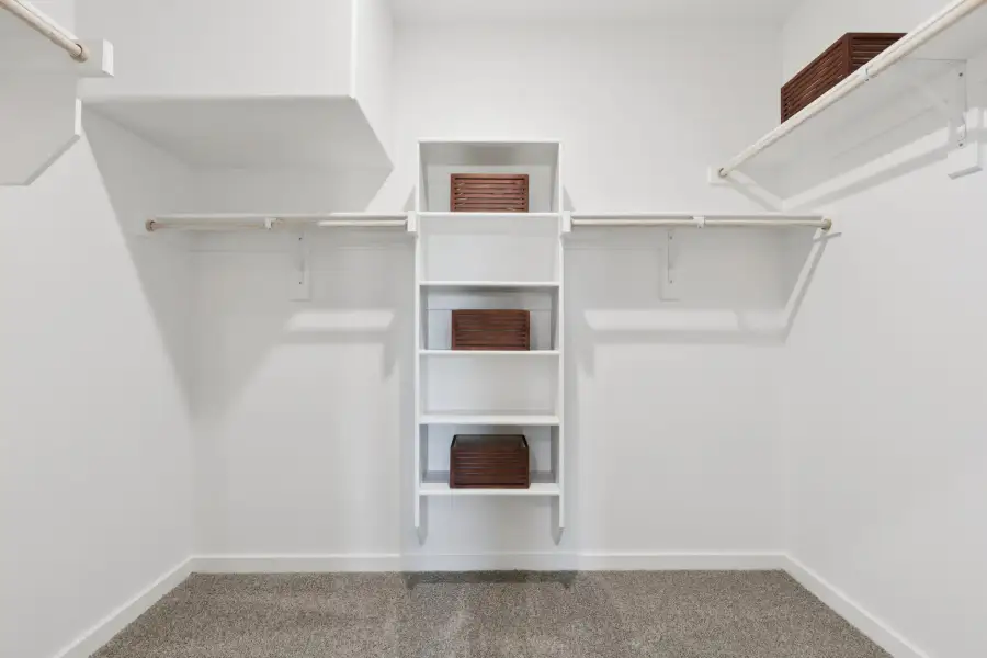 Primary Closet in the Magnolia home plan by Trophy Signature Homes – REPRESENTATIVE PHOTO Primary Closet in the Magnolia home plan by Trophy Signature Homes – REPRESENTATIVE PHOTO