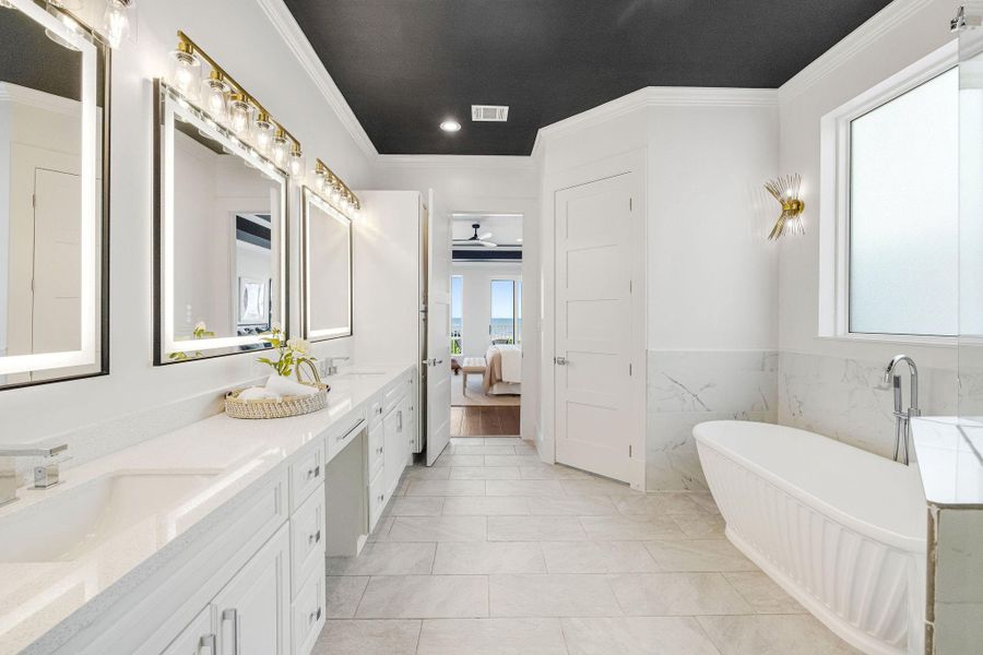 Beach views even from your primary bathroom.