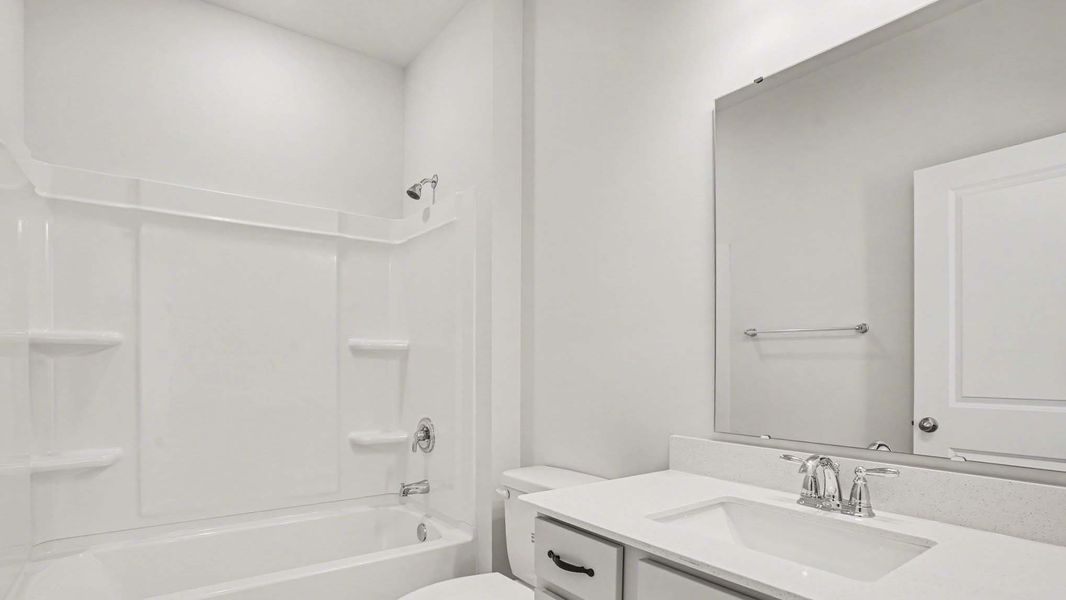 Representative furnished interior of a home built from the Danville by D.R. Horton in Chapman Village, Conway (Image 8).