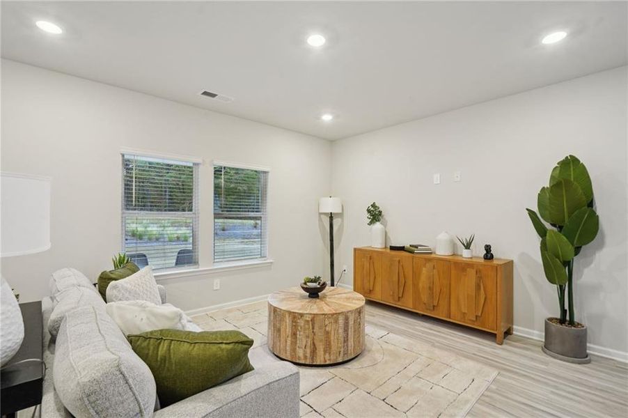 Furnished interior view inside a new home in Avalon - Reserve Series, Conyers (Image 6).