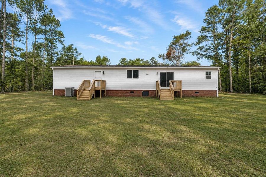 Exterior details and patio area of a home in , Holly Hill (Image 29).