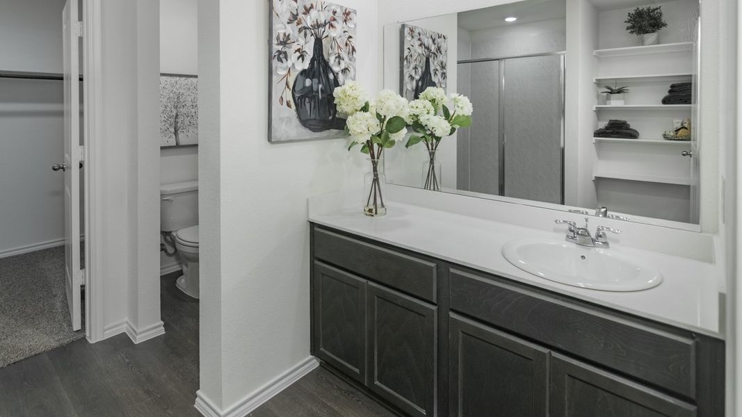 Representative furnished interior of a home built from the X40J Justin by D.R. Horton in Valor Farms, Royse City (Image 10).