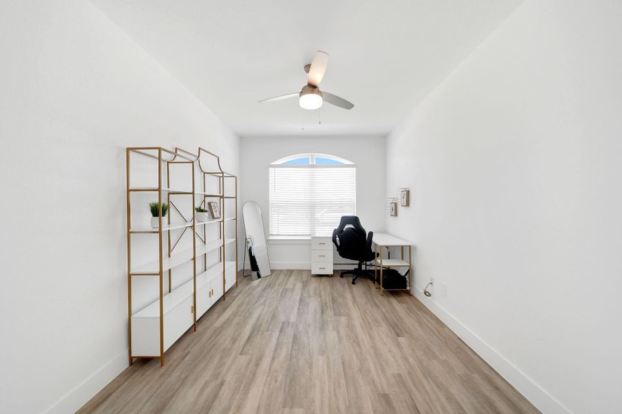 The dedicated office, ideally suited for remote work, is located down the front hallway, providing a private workspace.