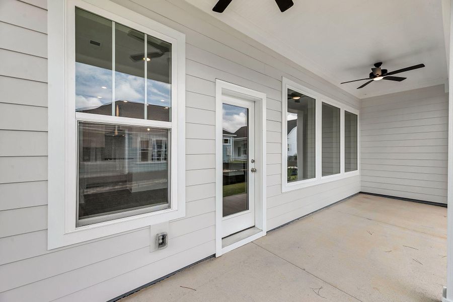 Exterior details and patio area of a home in Nexton – Midtown – The Garden Collection, Summerville (Image 25).