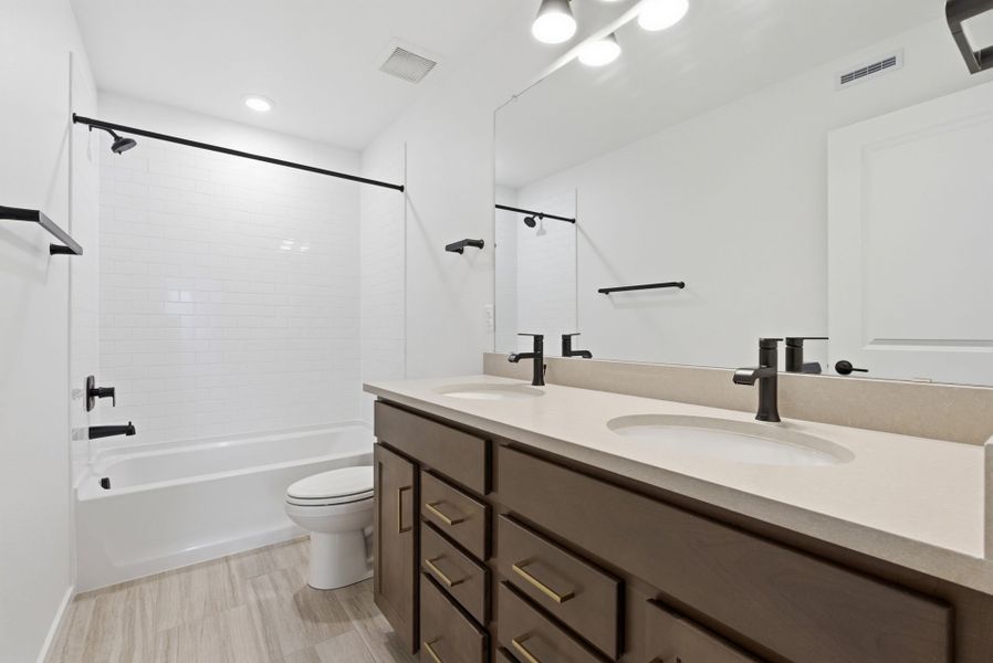 Furnished interior view inside a new home in Harvest Crossing, Aurora (Image 7).