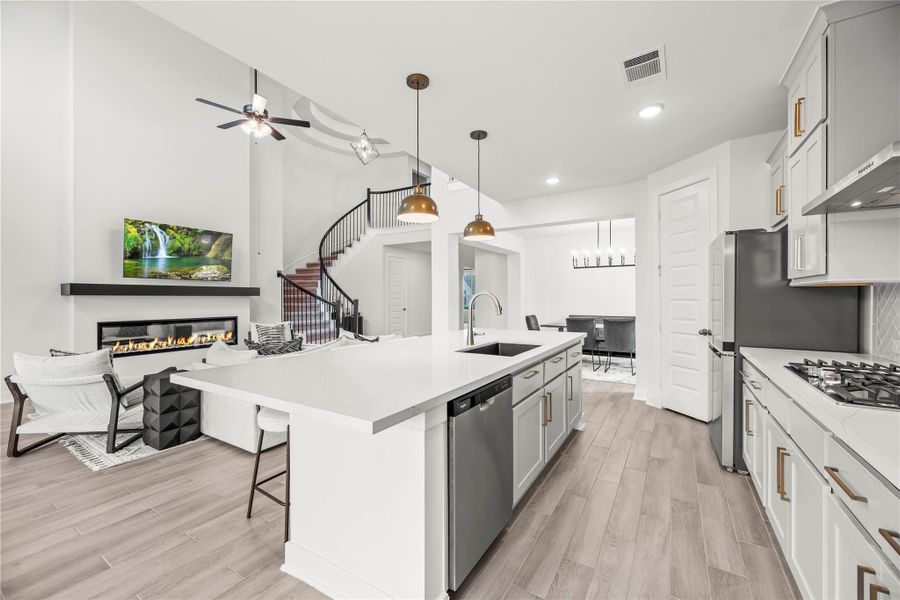 Don’t miss a moment! This spectacular island kitchen opens effortlessly to the dining area and family room, making it easy to cook, entertain, and enjoy all the action without missing a beat.