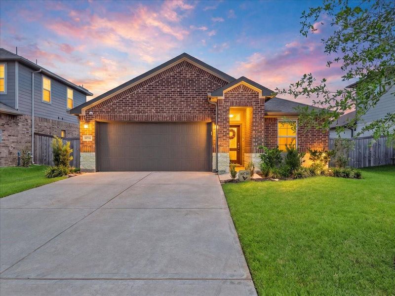 Front exterior of a new home in , Texas City, TX, highlighting curb appeal (Image 1). Front exterior of a new home in , Texas City, TX, highlighting curb appeal (Image 1).