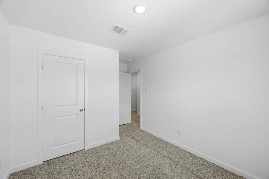 Spacious, unfurnished interior of a new home in Baron Village, Conroe (Image 12). Spacious, unfurnished interior of a new home in Baron Village, Conroe (Image 12).