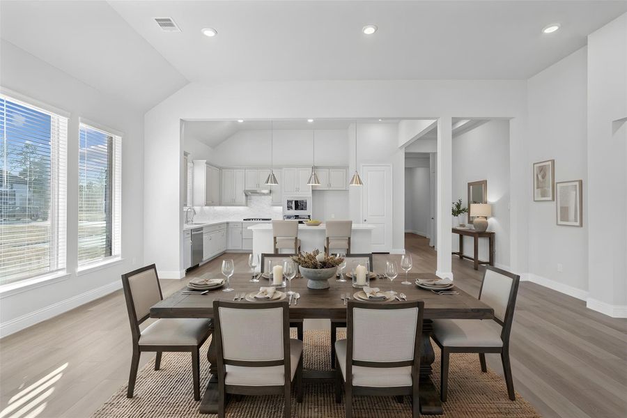 Make memories gathered around the table with your family and friends! This dining room features high ceilings, large windows, recessed lighting, and effortless access to both the kitchen and Great Room! *Virtually Staged Make memories gathered around the table with your family and friends! This dining room features high ceilings, large windows, recessed lighting, and effortless access to both the kitchen and Great Room! *Virtually Staged