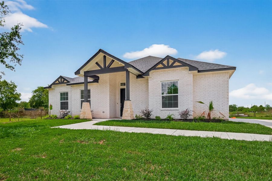 Front exterior of a new home in , Hitchcock, TX, highlighting curb appeal (Image 25).