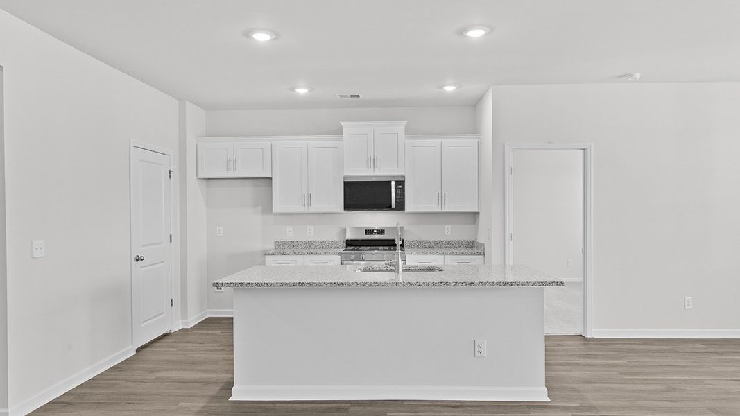 Furnished interior view inside a new home in Highland Hills, Graniteville (Image 6).