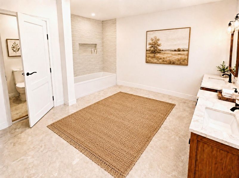 The primary bathroom features a separate mud-set shower and soaking tub, adding both style and function to the space. The bathroom also includes tile work throughout the wet areas, a dual vanity with countertop space, and clean modern finishes that give the room a bright, polished look. * Photo rendering shown as home is currently under construction | Final appearance may vary * The primary bathroom features a separate mud-set shower and soaking tub, adding both style and function to the space. The bathroom also includes tile work throughout the wet areas, a dual vanity with countertop space, and clean modern finishes that give the room a bright, polished look. * Photo rendering shown as home is currently under construction | Final appearance may vary *