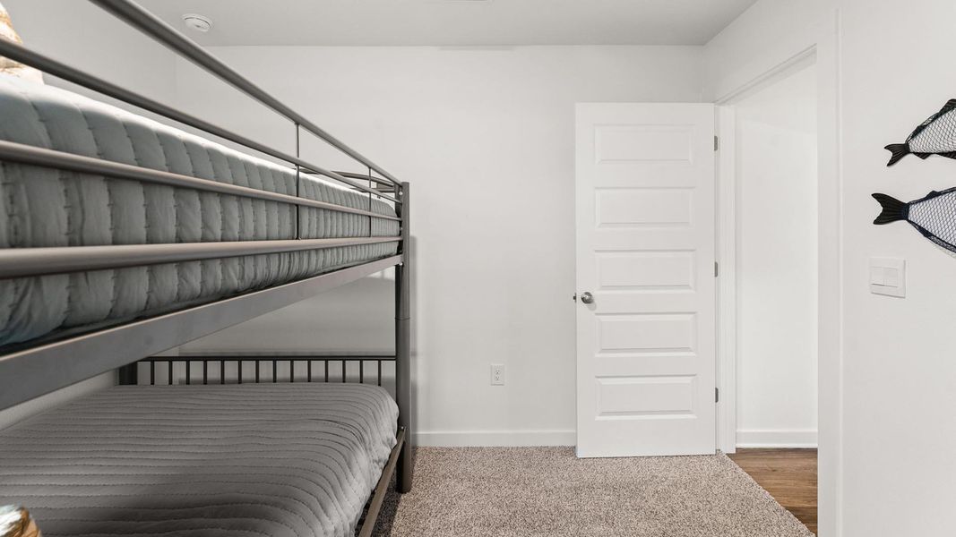 Furnished interior view inside a new home in Magnolia at the Bluffs Phase 3, Freeport (Image 28).