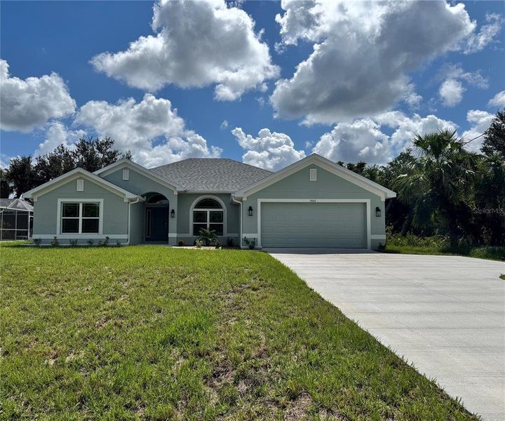 Exterior details and patio area of a home in North Port, North Port (Image 17).