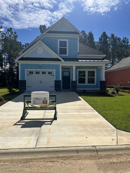 Front exterior of a new home in White Oak Estates, Conway, SC, highlighting curb appeal (Image 2). Front exterior of a new home in White Oak Estates, Conway, SC, highlighting curb appeal (Image 2).