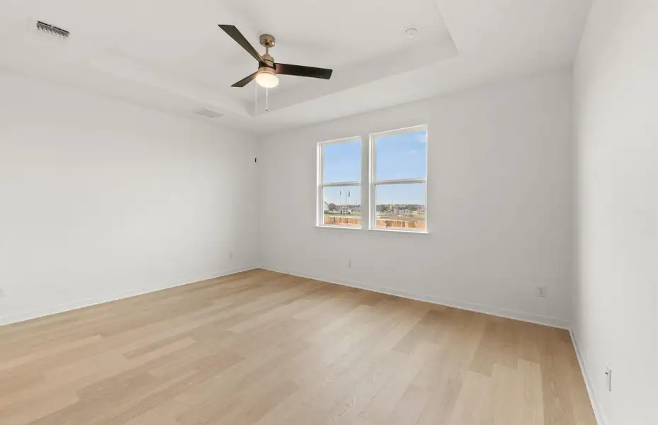 Interior photos- Photo of Pulte model home with same floor plan, not of actual home listed.