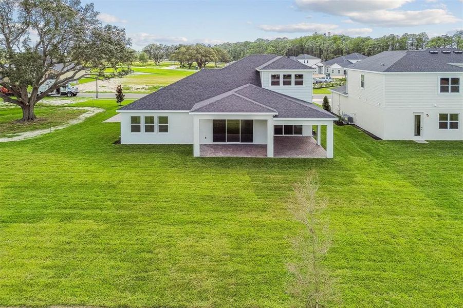 Exterior details and patio area of a home in Solace at Corner Lake, Orlando (Image 36).