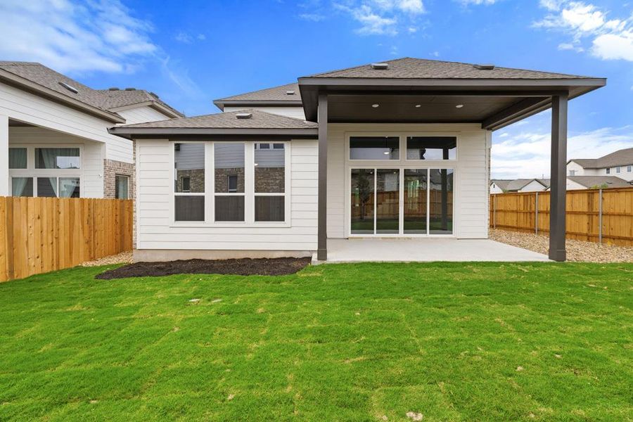 Exterior details and patio area of a home in Heritage, Dripping Springs (Image 24).