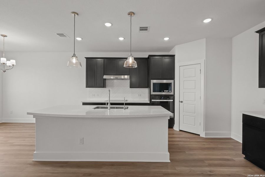 Furnished interior view inside a new home in Megan's Landing, Castroville (Image 9).