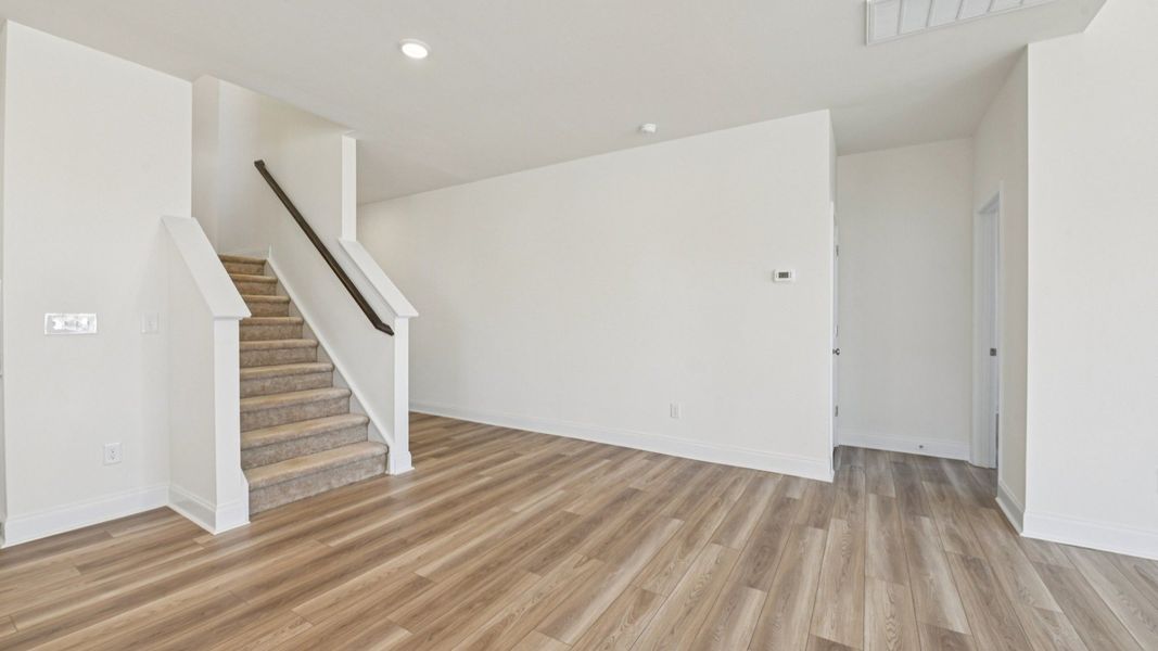 Representative furnished interior of a home built from the Chelsea by DRB Homes in Jasper Landing, Four Oaks (Image 10).