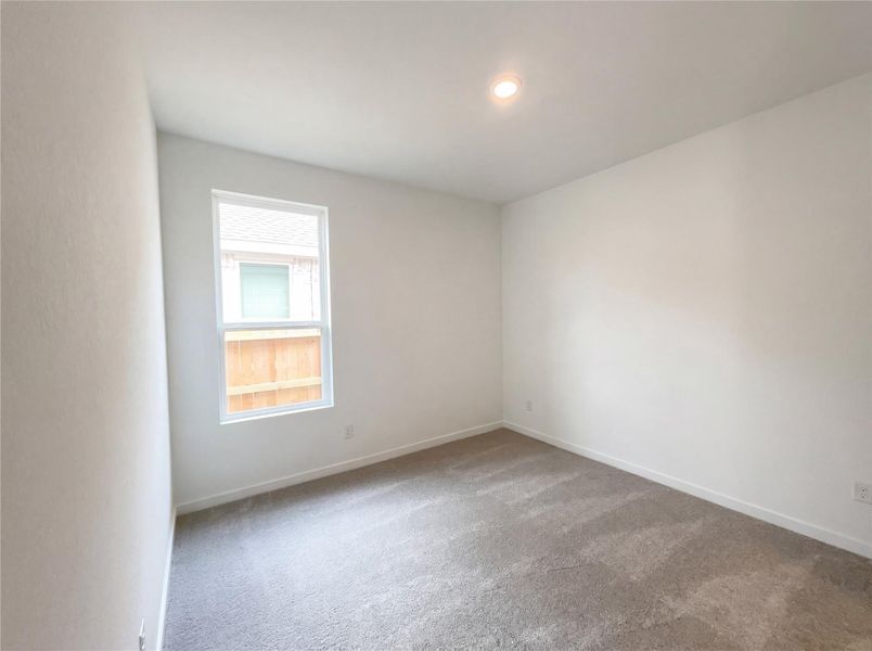 Spacious, unfurnished interior of a new home in Sunterra, Katy (Image 15).