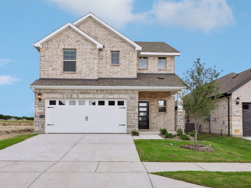 Front exterior of a new home in Parks at Foster Crossing - Spring Series, Anna, TX, highlighting curb appeal (Image 1). Front exterior of a new home in Parks at Foster Crossing - Spring Series, Anna, TX, highlighting curb appeal (Image 1).
