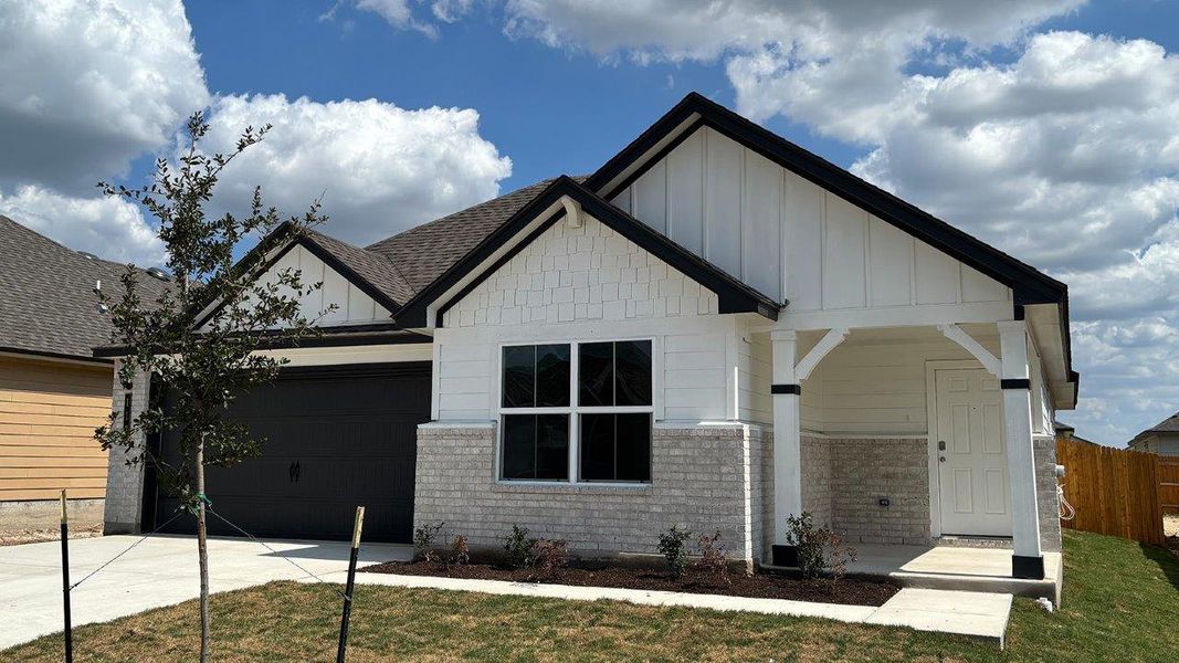 Front exterior of a new home in Eastern Wells, Jarrell, TX, highlighting curb appeal (Image 16).