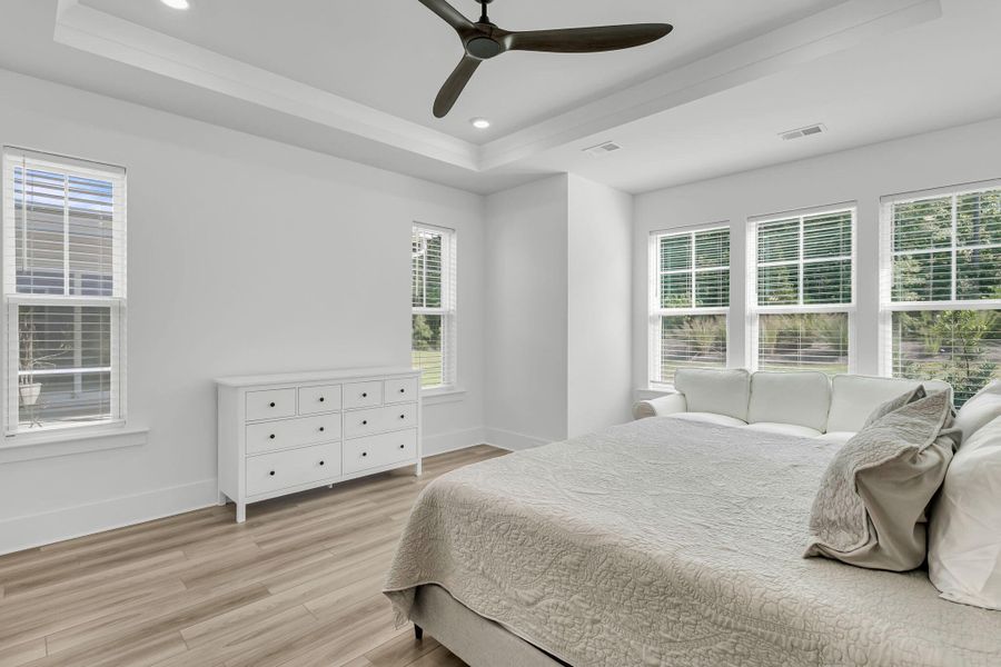 Furnished interior view inside a new home in Summerwind Crossing at Lakes of Cane Bay, Summerville (Image 35).