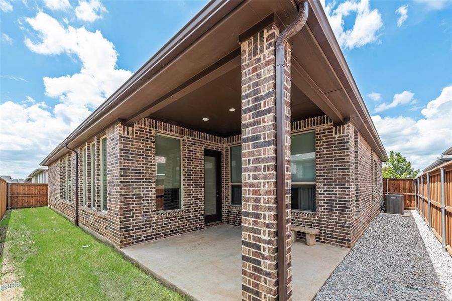 Exterior details and patio area of a home in Elements at Viridian | Active Adult 55+, Arlington (Image 2). Exterior details and patio area of a home in Elements at Viridian | Active Adult 55+, Arlington (Image 2).