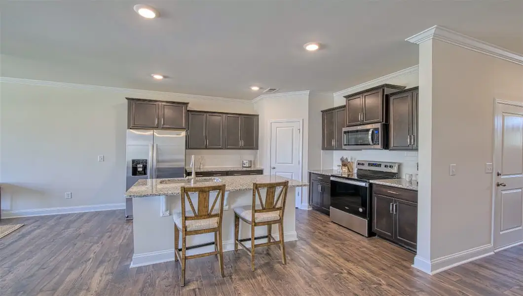 Furnished interior view inside a new home in Townes at Tap Root Farms, Fletcher (Image 3). Furnished interior view inside a new home in Townes at Tap Root Farms, Fletcher (Image 3).