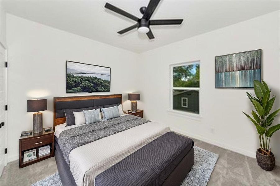 Bedroom featuring light carpet, baseboards, and ceiling fan Bedroom featuring light carpet, baseboards, and ceiling fan