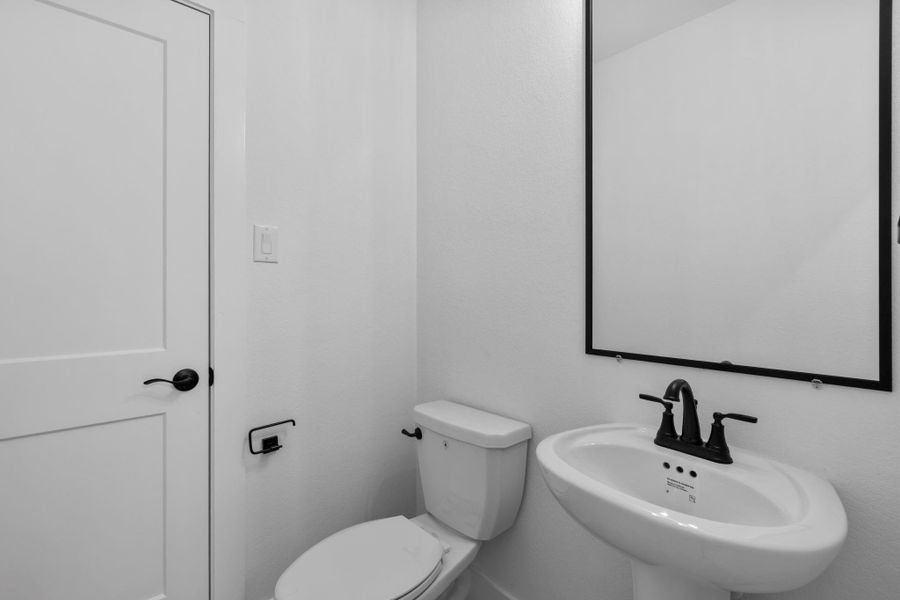 Furnished interior view inside a new home in Wood Leaf Reserve, Tomball (Image 12).
