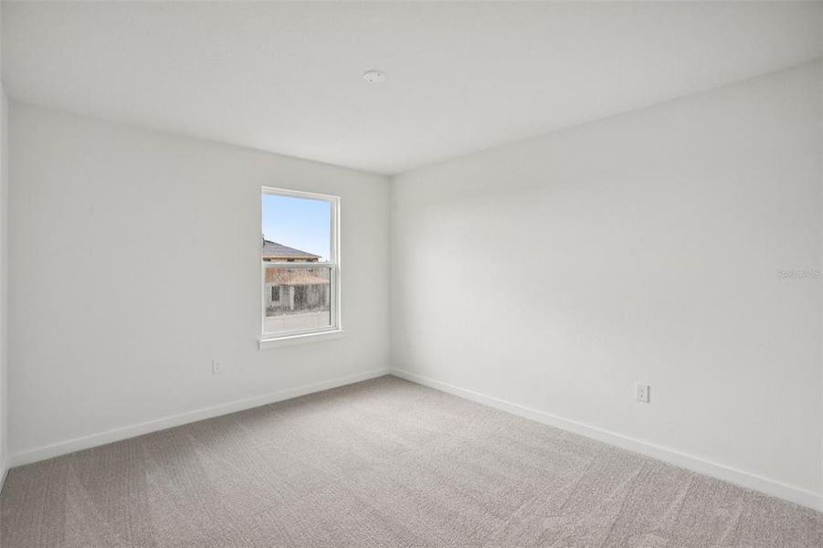 Spacious, unfurnished interior of a new home in Grasslands West, Lakeland (Image 40).