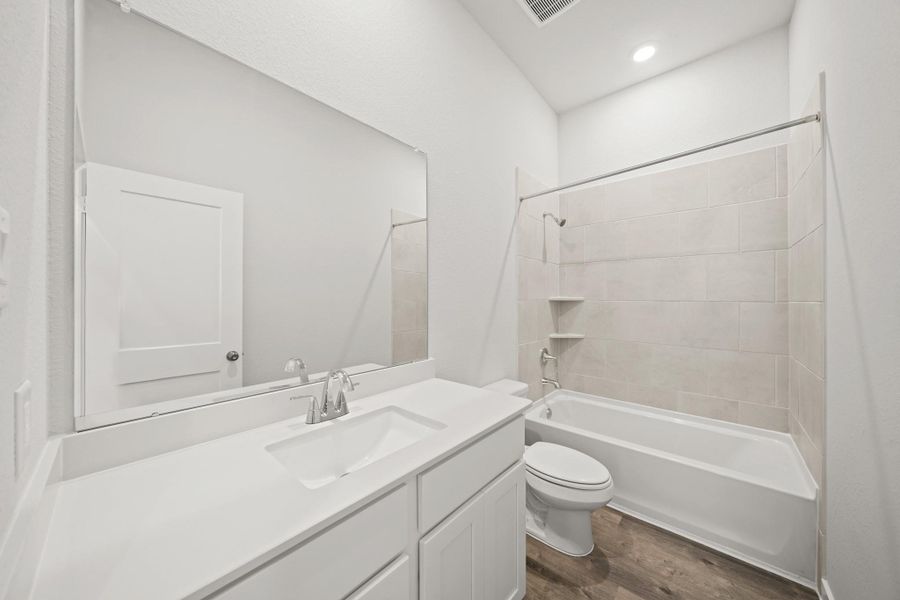 Furnished interior view inside a new home in Creekland Village at Bridgeland, Cypress (Image 8).