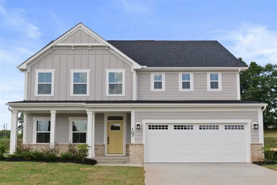 Front exterior of a new home in Stillwood Farms, Easley, SC, highlighting curb appeal (Image 1).