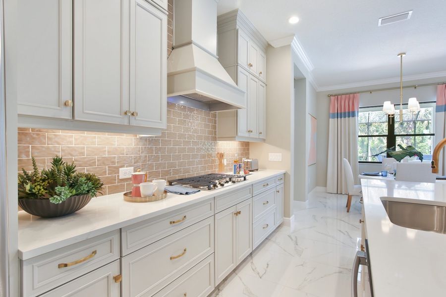 Furnished interior view inside a new home in Boca Royale Golf & Country Club at Wellen Park, Englewood (Image 15).