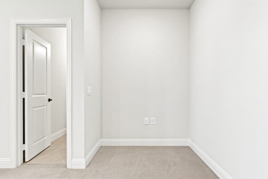 Spacious, unfurnished interior of a new home in The Tribute, The Colony (Image 36).
