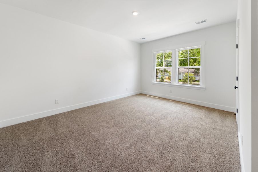 Spacious, unfurnished interior of a new home in Indigo Place, North Charleston (Image 22).